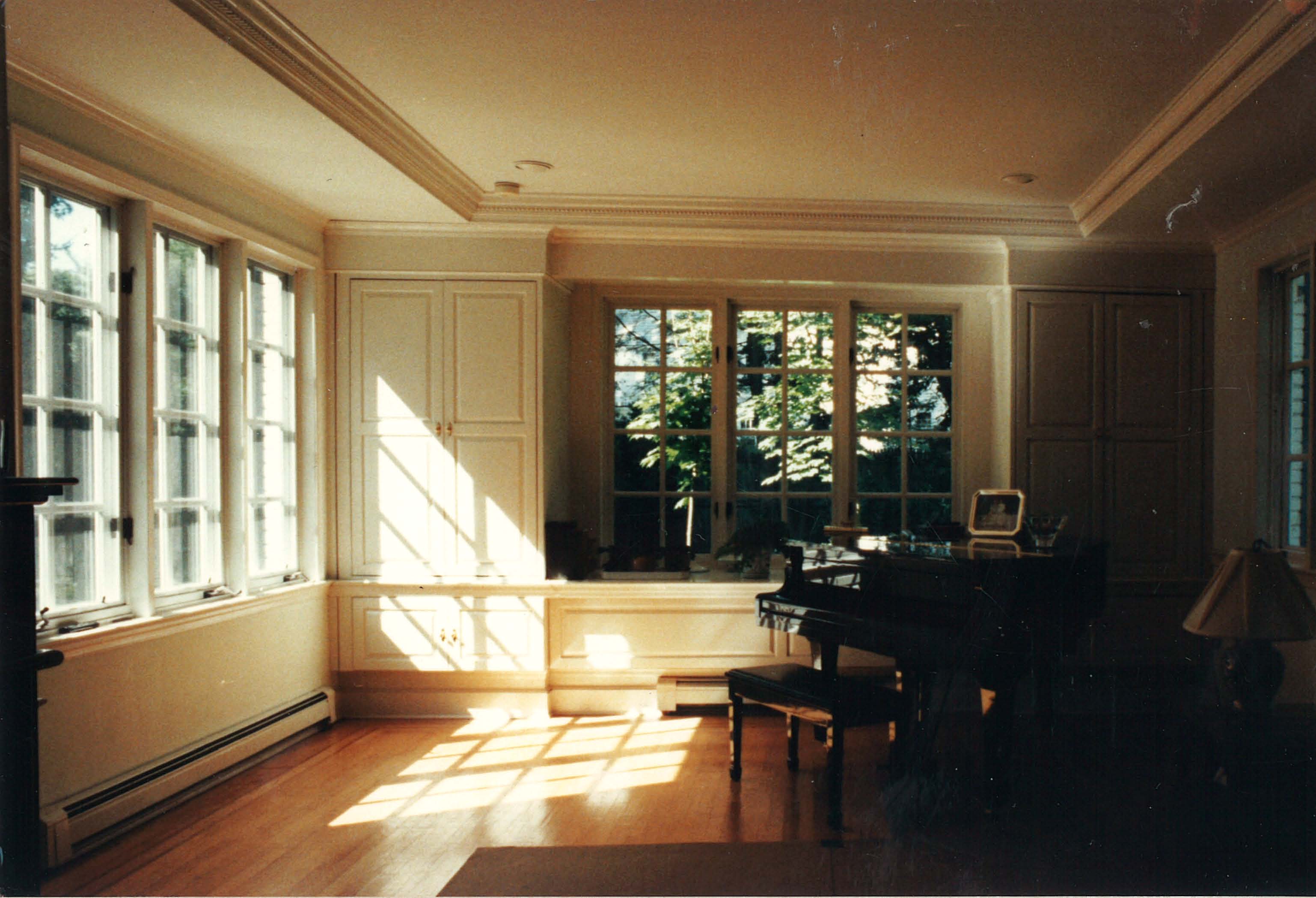 Residential design interior of new living room and cabinetry.