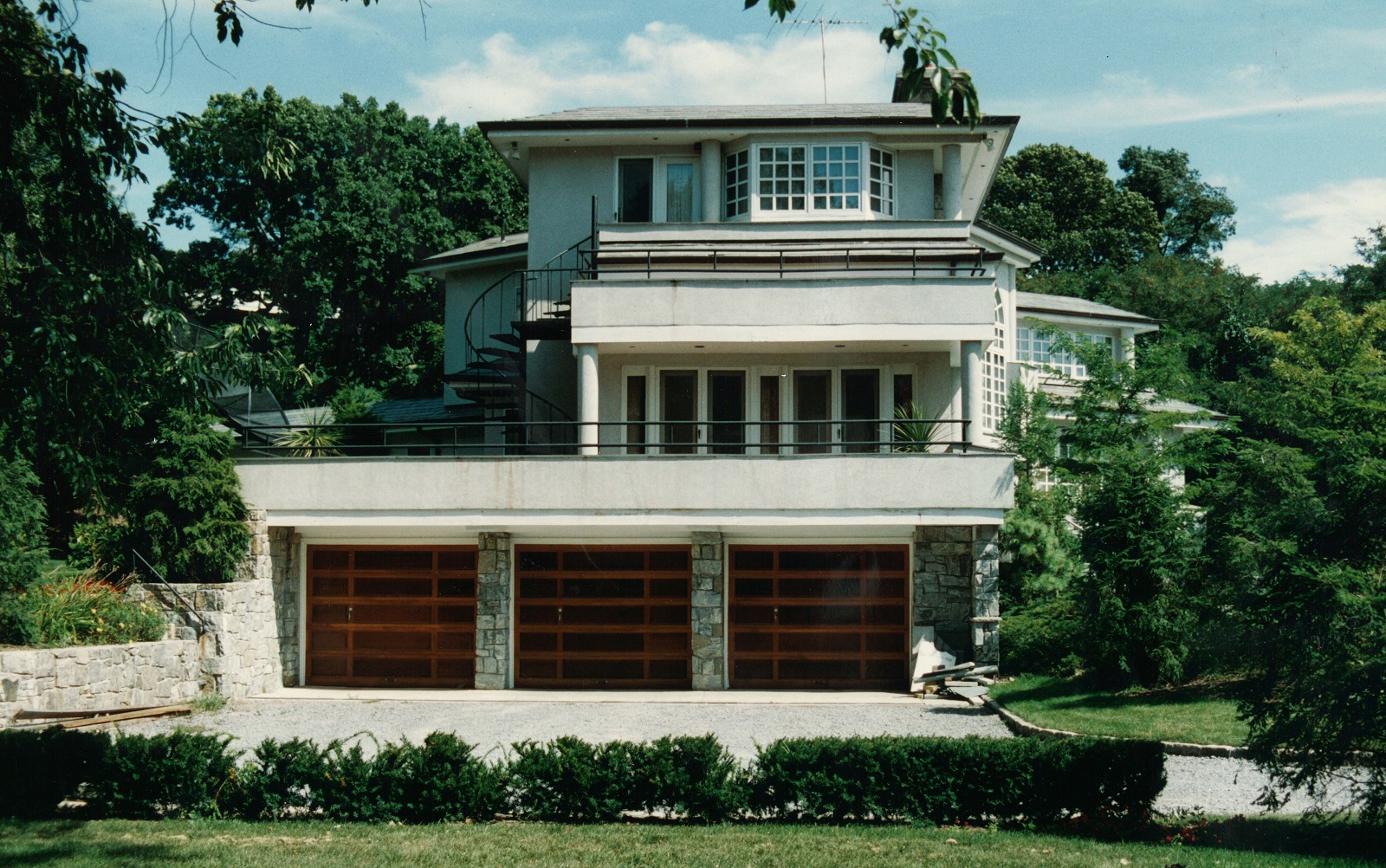 Residential design added 3 car garage.