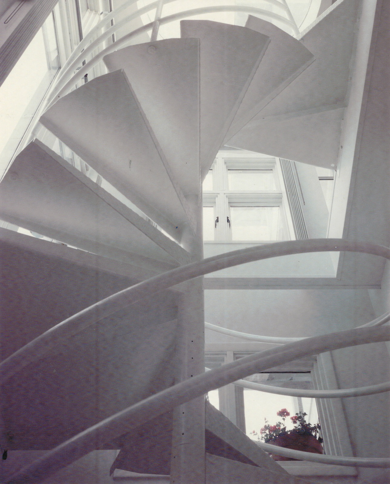 Circular stair from living room to master bedroom.